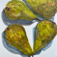 Four green pears on a light blue background